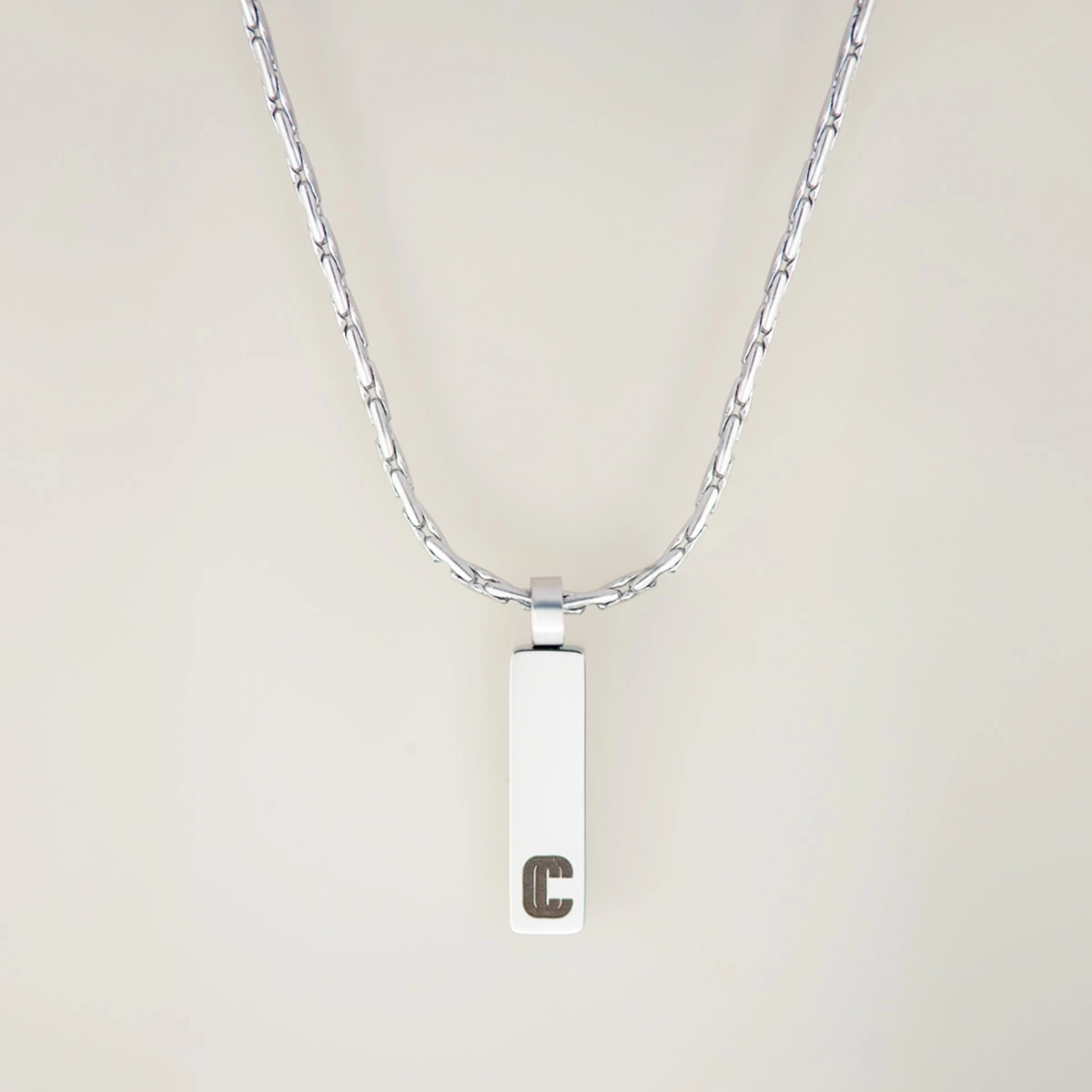 Pendentif forma, maille forçat limée, argenté